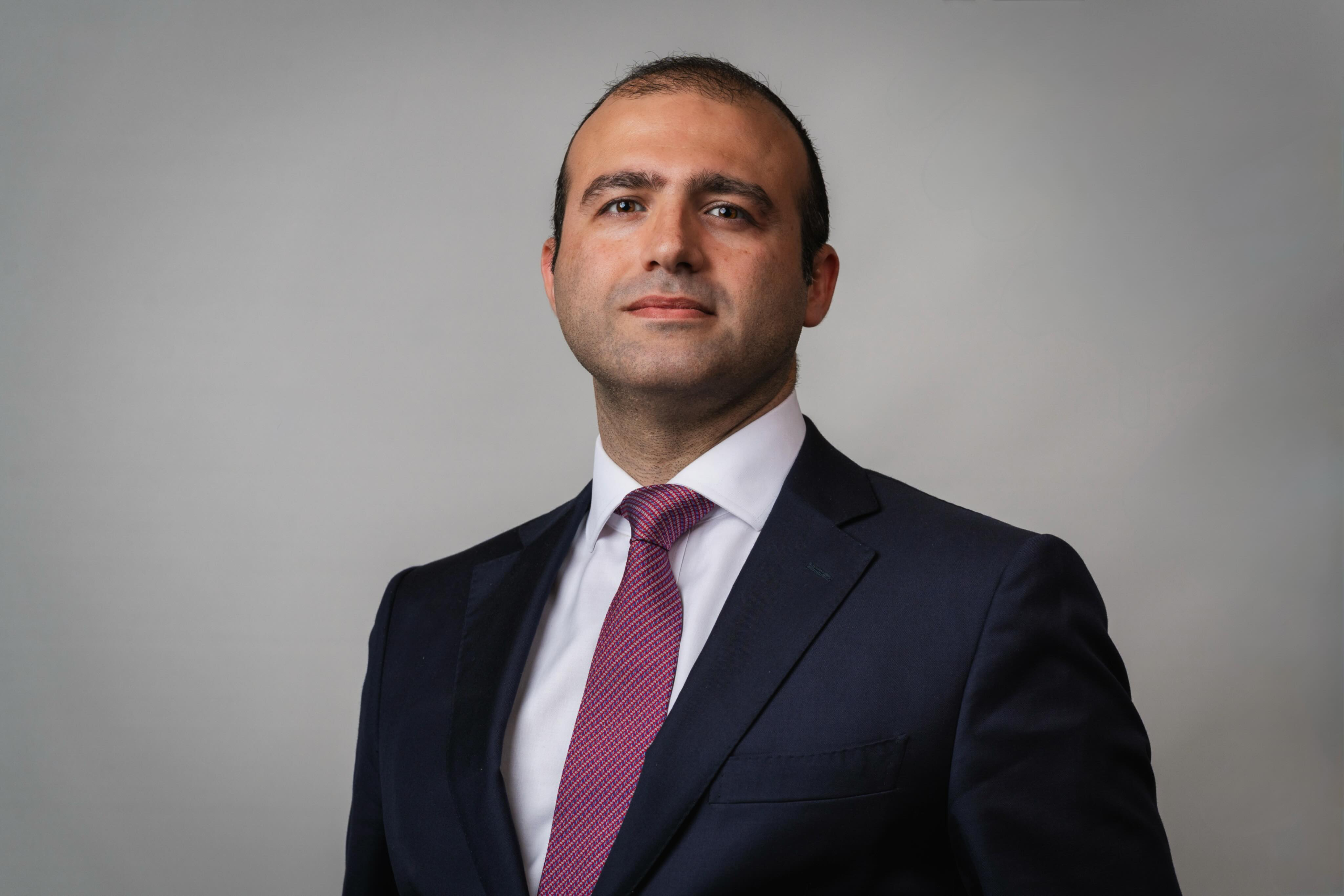 Joseph Loloi, Esq. in a suit and tie